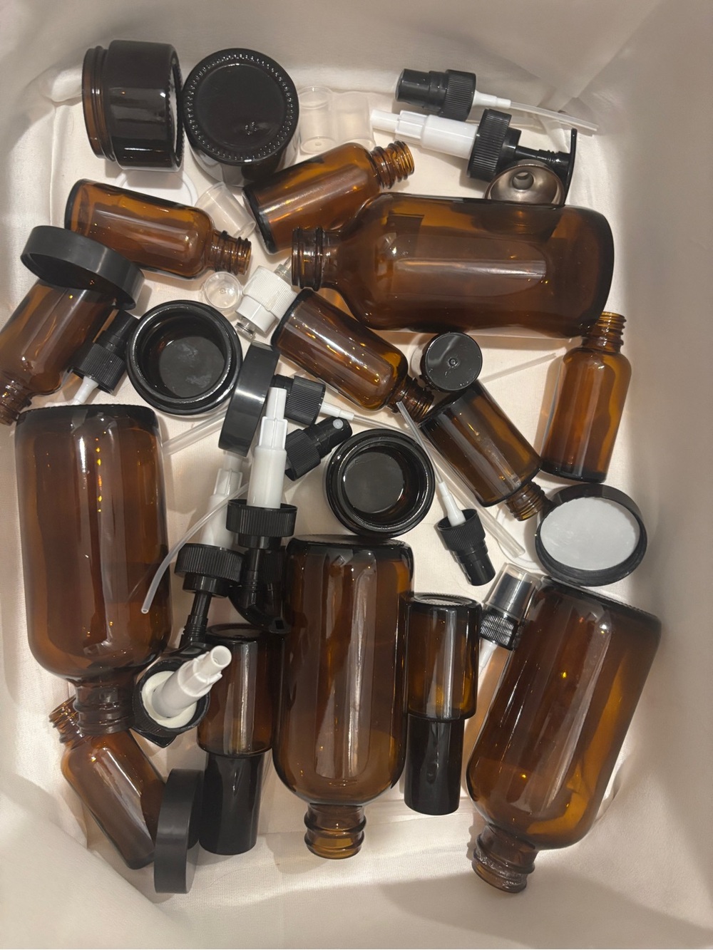 Amber Glass Bottles with Black and White Pumps and Caps